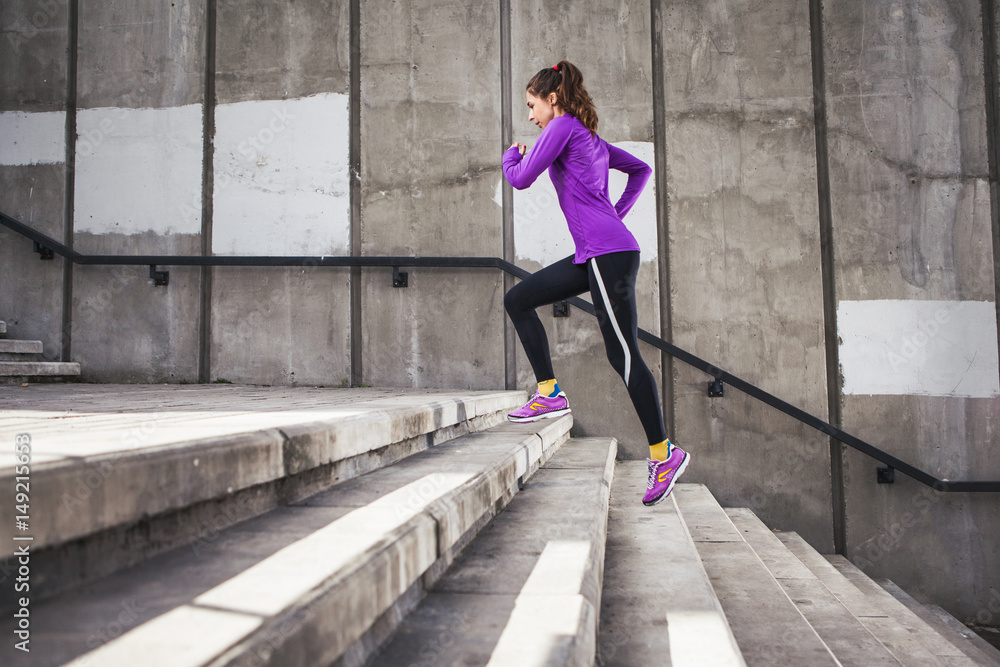 young sporty woman running