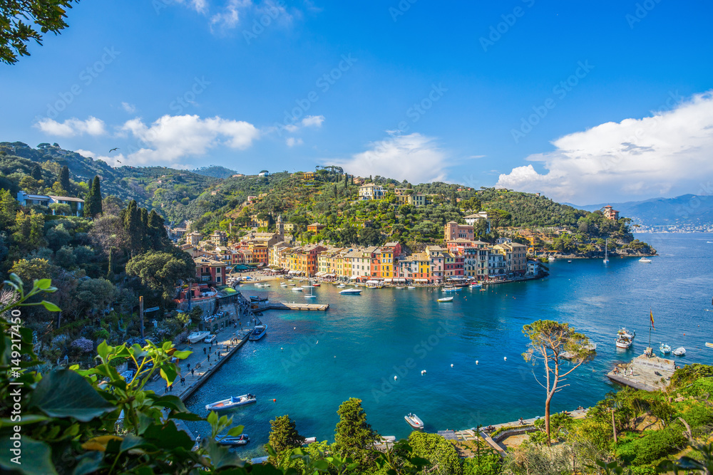 PORTOFINO, ITALY, APRIL 8, 2017 - Panoramic view of Portofino, an Italian fishing village, Genoa province, Italy. A tourist place with a picturesque harbour and colorful houses