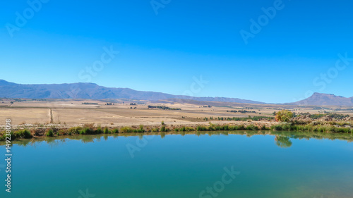 Lake and Mountain view over Desert Farm Lands in South Africa