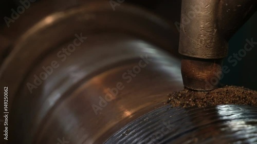 Hard surfacing by submerge arc welding process. Cnc machine builds up the metal on the huge shaft.