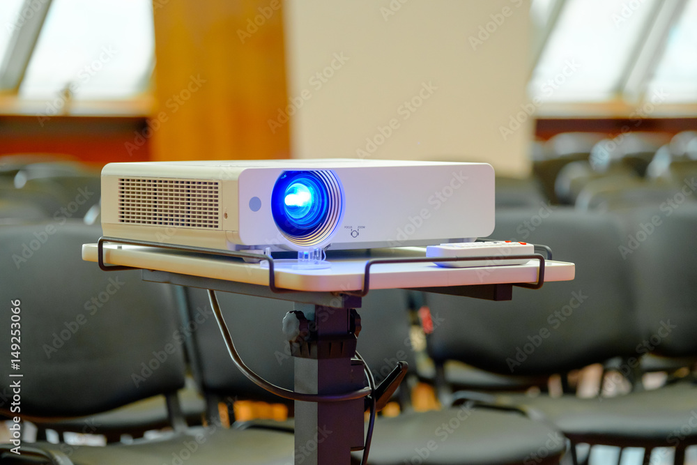 Working projector at the conference hall