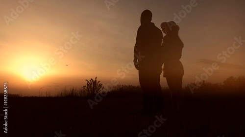 Wallpaper Mural Romantic couple in love watching beautiful sunset Torontodigital.ca
