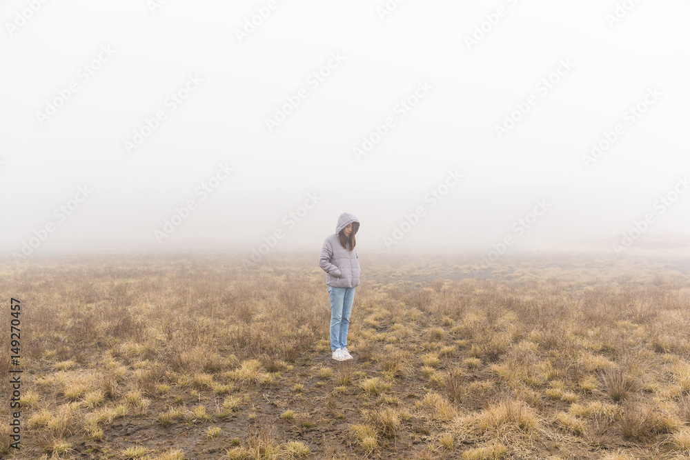 Woman inside the fog