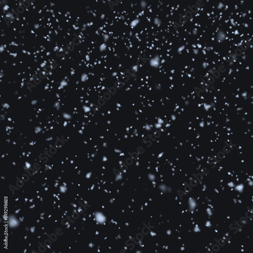 Snow falling at night