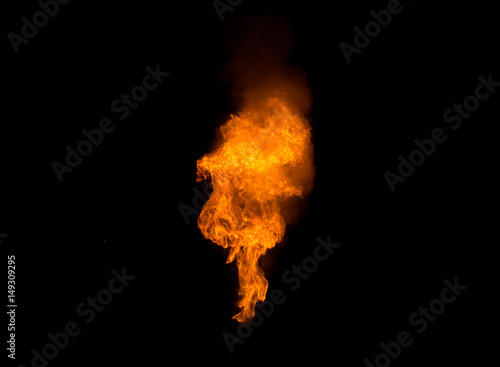 Realistic fiery explosion over a black background © pav1007