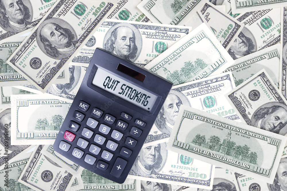 Text of quit smoking with calculator and dollar Text of quit smoking with calculator and dollar