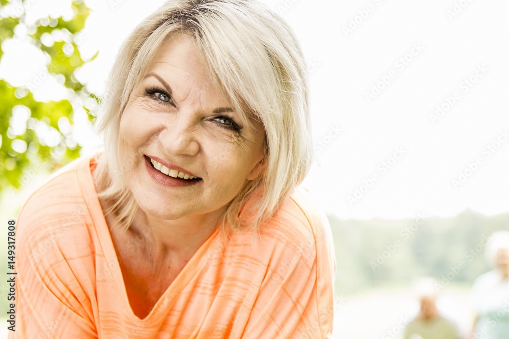 Mature woman resting after exercise Mature woman resting after exercise