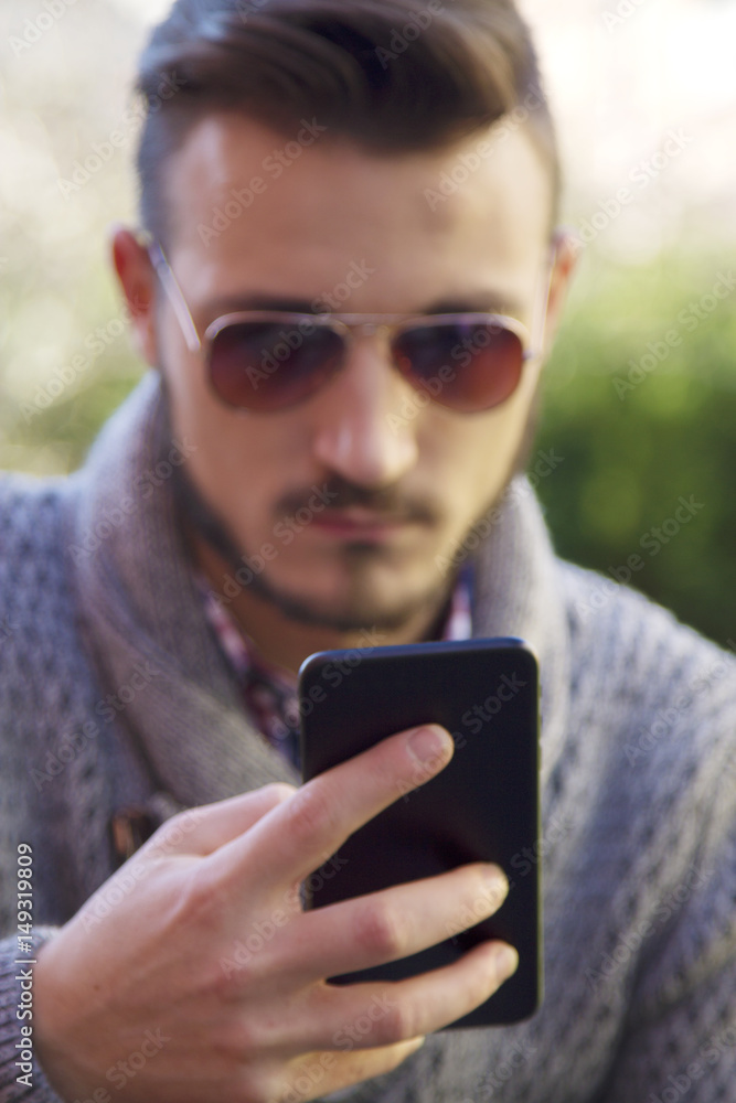 Man hipster using cellphone Man hipster using cellphone