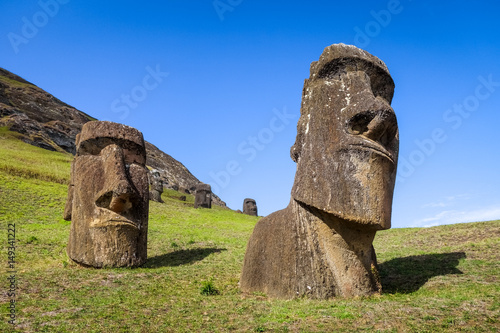Moais statues on Rano Raraku volcano, easter island photo
