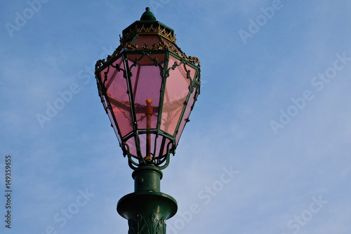 Lantern near the canal in Venice, Italy photo
