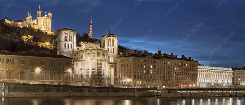 view of Lyon over the Saone river at night