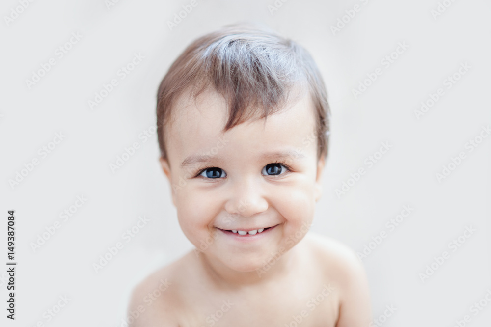Portrait of a beautiful one year old little baby. Close-up. Portrait of a beautiful one year old little baby. Close-up.