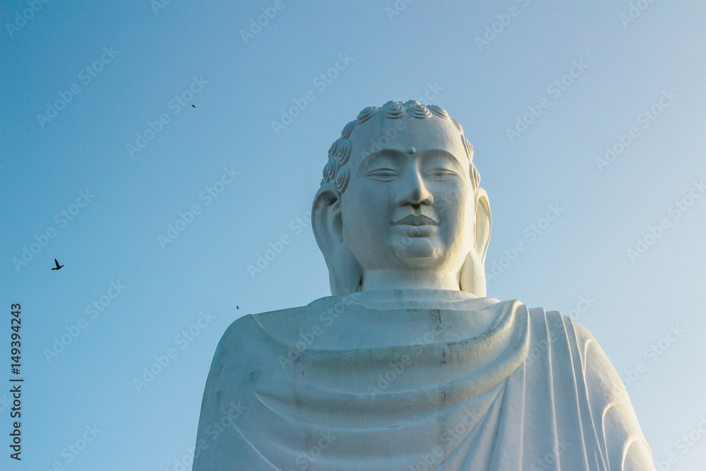 Amitabha Buddha statue on the entrance to Quang Minh Mahayana Buddhism temple in Da Nang, Vietnam Amitabha Buddha statue on the entrance to Quang Minh Mahayana Buddhism temple in Da Nang, Vietnam