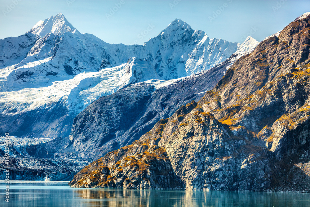 Alaska nature travel. Glacier Bay National Park, Alaska, USA. Glaciers landscape of alaska mountain peaks and glacier melting in water. View from cruise ship.