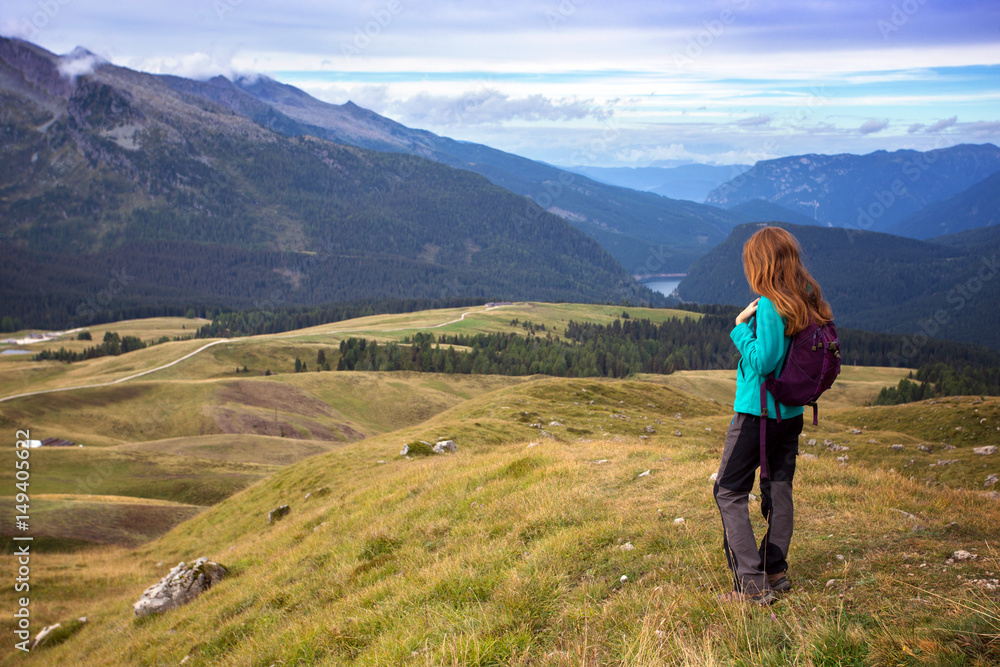 tourist girl at the Dolomites