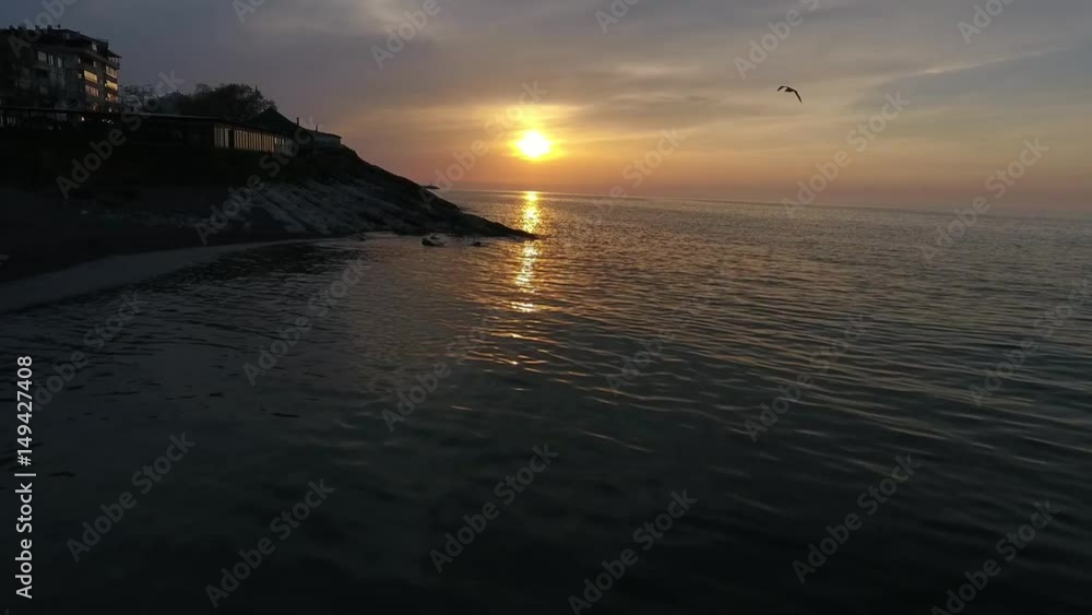 Shot of a beautiful summer sunset at the beach. footage Shot of a beautiful summer sunset at the beach. footage