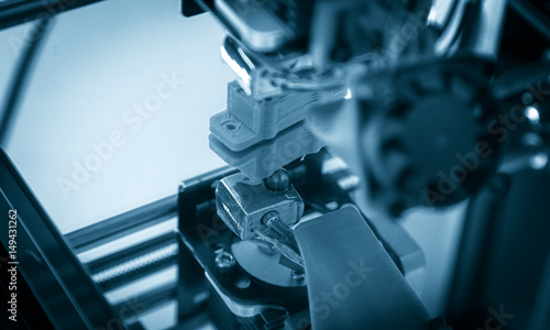 Electronic three dimensional plastic printer during work , 3D , printing.