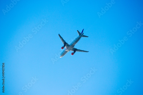 Fototapeta Naklejka Na Ścianę i Meble -  Airplane. Clear blue sky.
