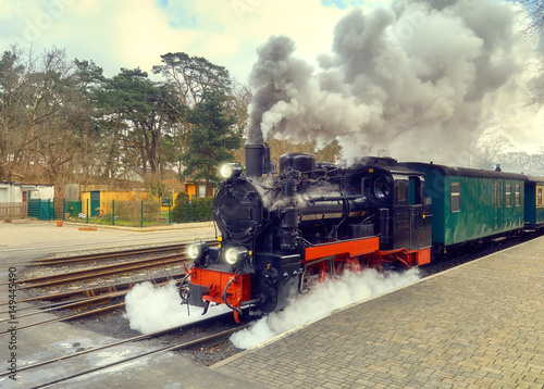 Historical steam train on end station in island Rugen, Germany
