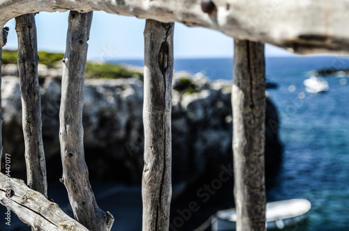 Fence with a cliff at the background
