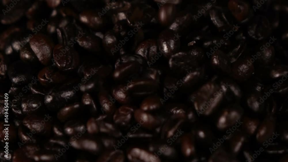 Coffee beans falling slow motion Coffee beans falling slow motion