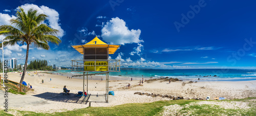 COOLANGATTA, AUS - MAY 01 2017: Snappers rock and Rainbow Bay beach with lifeguard tower, Gold Coast, Australia photo