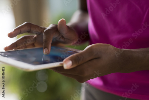 african american woman using tablet