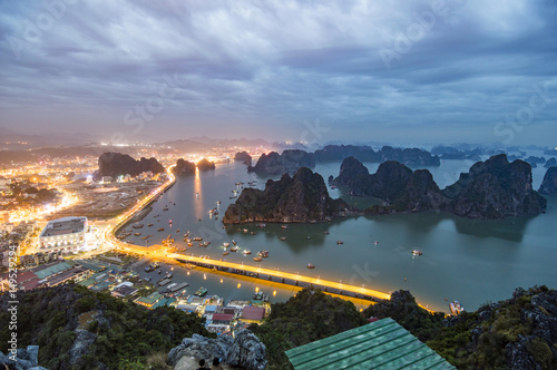 Ha Long (Halong) City cityscape at night view from Bai Tho Mountain with long exposure in Quang Ninh Province, Vietnam 