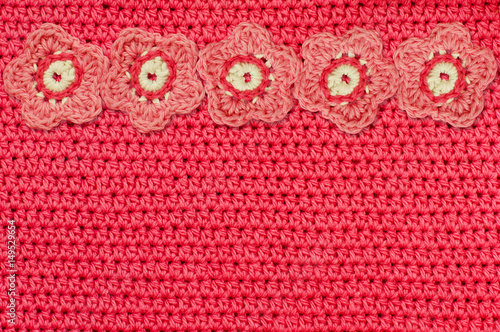 Red crochet fabric and hand...