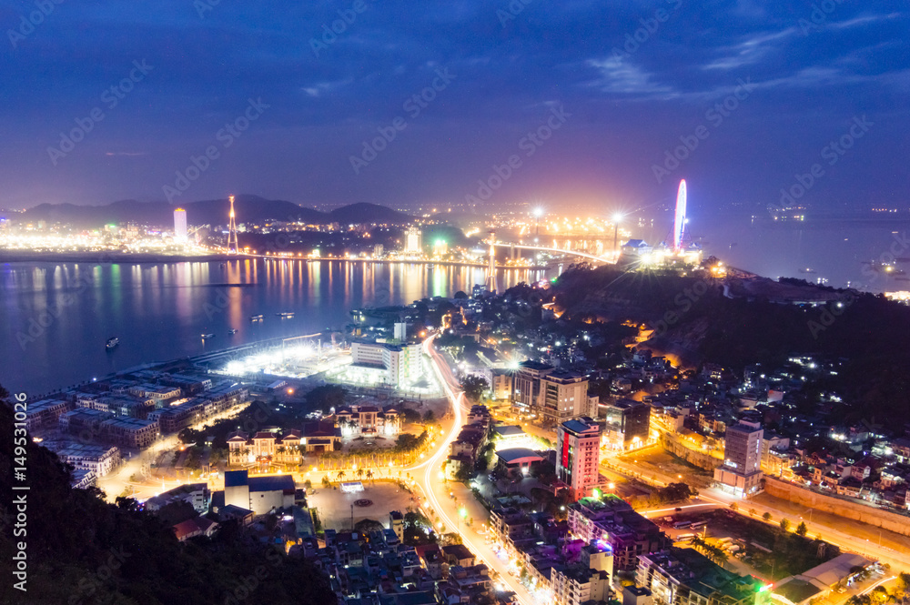 Ha Long (Halong) City cityscape at night view from Bai Tho Mountain with long exposure in Quang Ninh Province, Vietnam   