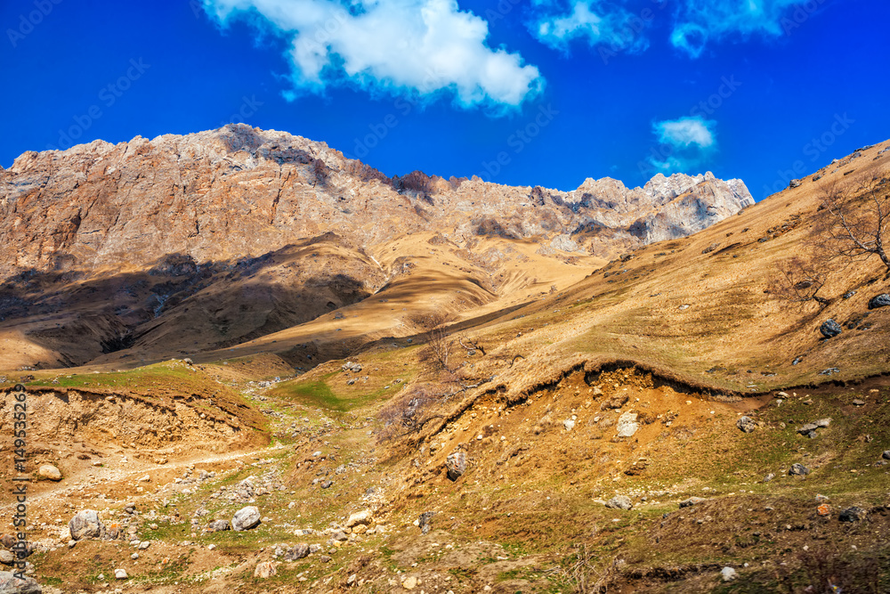 beautiful landscape of deserted mountains with blue sky, Russia, Republic Ingushetia