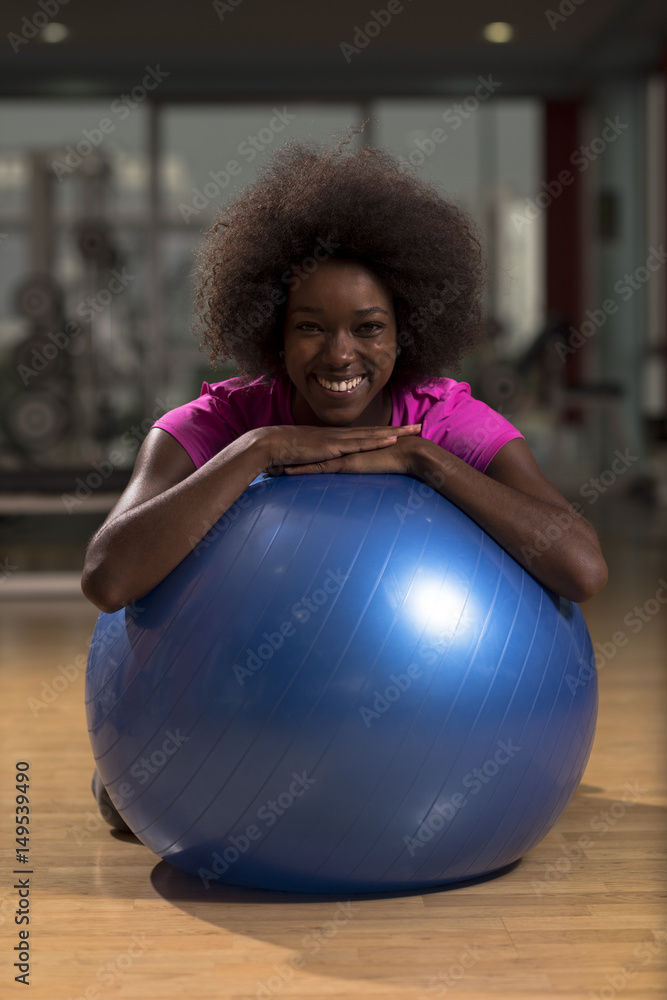 woman relaxing after pilates workout woman relaxing after pilates workout