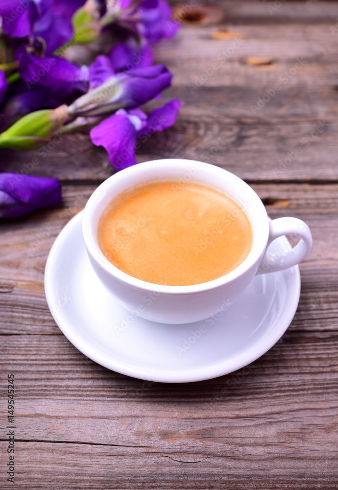 cup of fragrant black coffee on a gray table cup of fragrant black coffee on a gray table