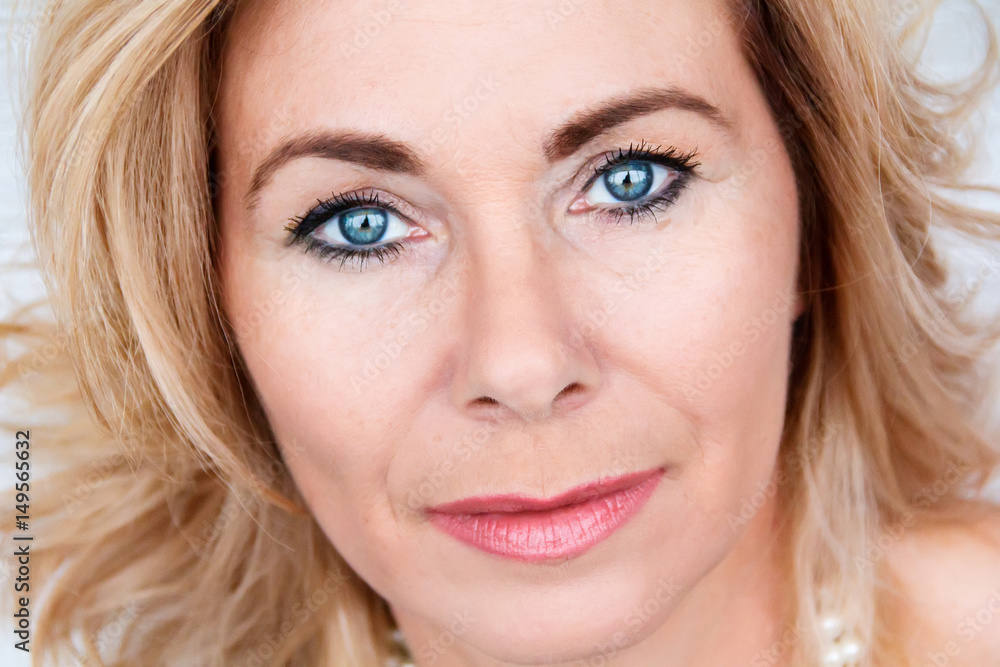 Fototapeta premium Portrait of adult blond woman