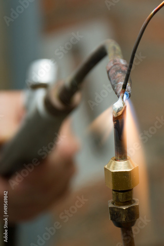 Gas cutter, soldering pipe photo