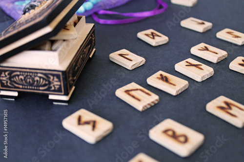 Wooden runes in casket