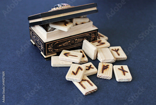 Wooden runes in casket