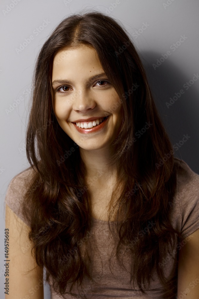 Closeup portrait of beautiful young happy woman Closeup portrait of beautiful young happy woman
