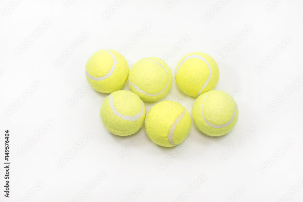 Six tennis ball isolated on white background.