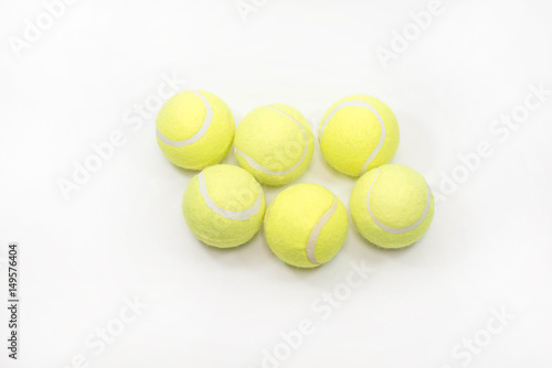 Six tennis ball isolated on white background. © lessimol