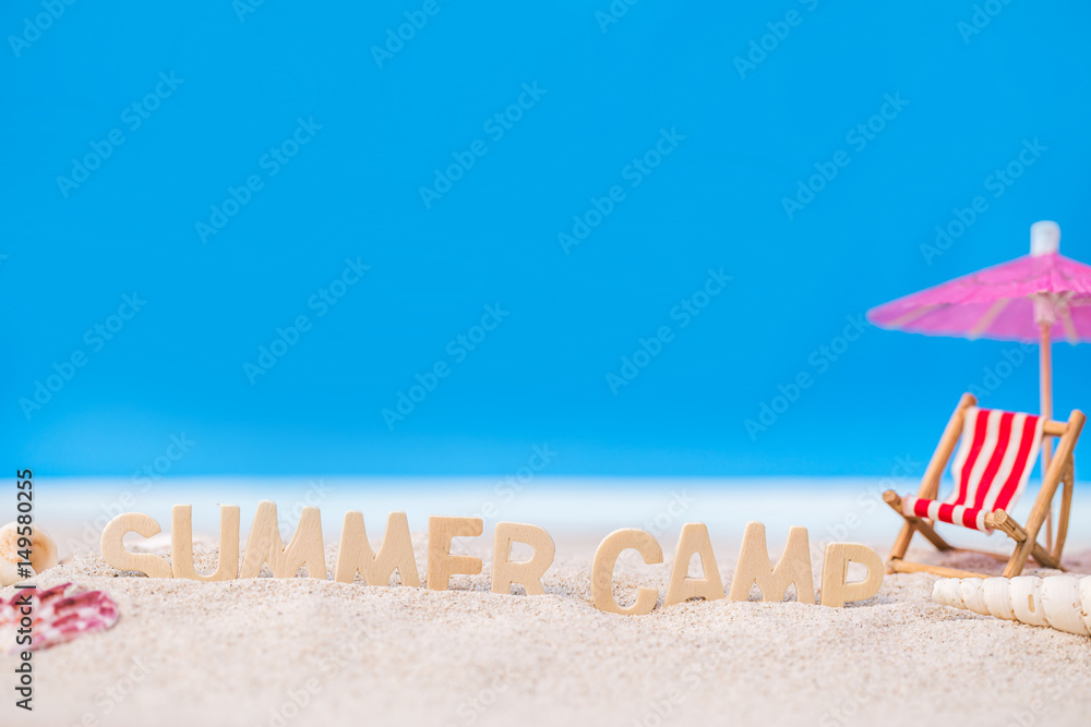 © pim pic - Summer holiday decoration with wooden text ,retro clock,beach chair and sea shall on sand beach with tropical blue sea and clear blue sky,Image For love summer holiday vacation travel Concept © pim pic - Summer holiday decoration with wooden text ,retro clock,beach chair and sea shall on sand beach with tropical blue sea and clear blue sky,Image For love summer holiday vacation travel Concept