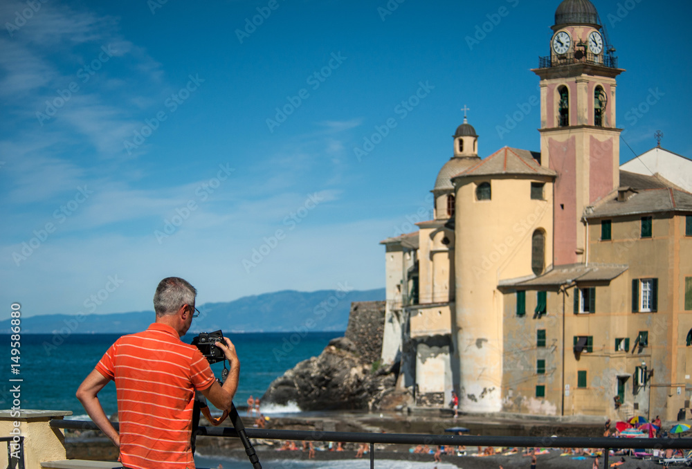 Photographer in Camogli beach, Liguria Photographer in Camogli beach, Liguria
