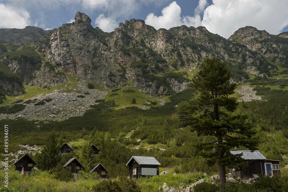 View of old wood rest-house, bivouac or bungalow by rest-house Maliovitza on the ecological walk toward Maliovitza peak in Rila mountain, Bulgaria
