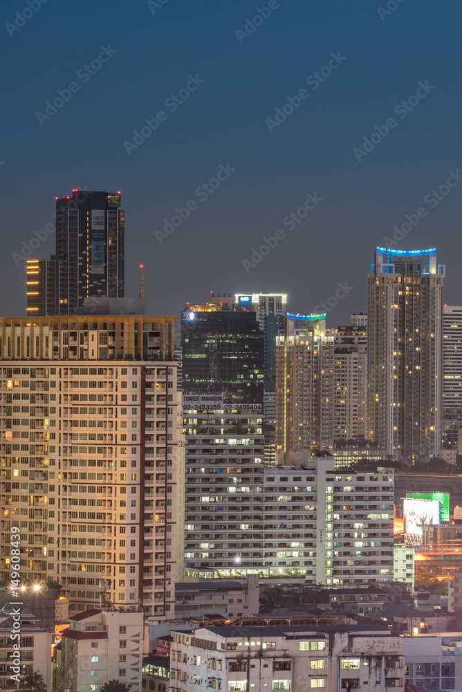 Cityscape with light show from building of Bangkok