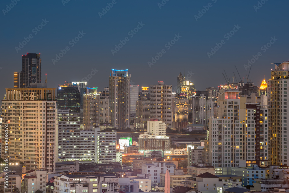 Cityscape with light show from building of Bangkok