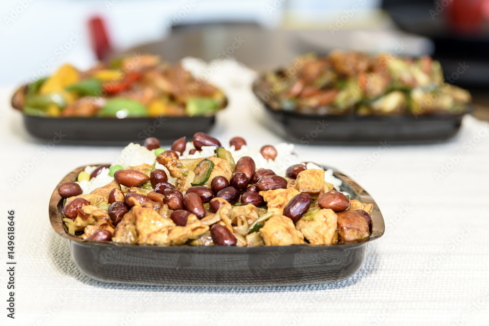Delicious Chinese food with rice, beans and meat Delicious Chinese food with rice, beans and meat