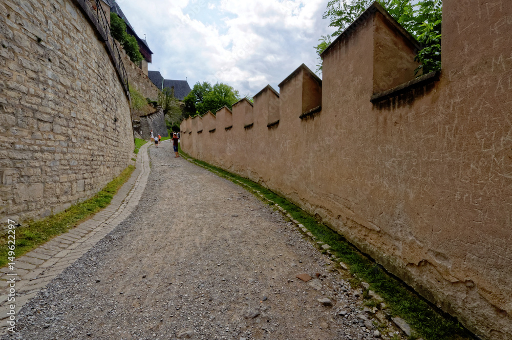 Gravel road with stone walls