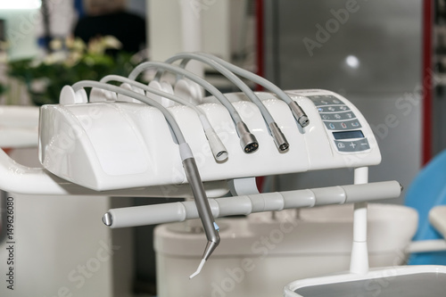 Modern dental office with medical tools, dentist room interior. Stomatology instruments background