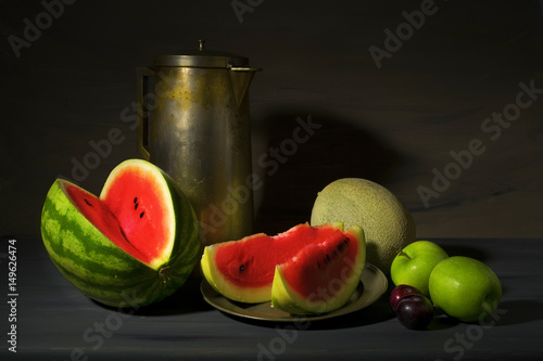 vintage style food still life with watermelons and other fruit