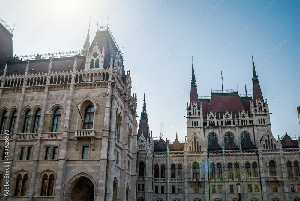 Parliament building in Budapest, with details on the facade and  monuments of the building